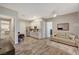 Bright open space with full kitchenette, small dining, and comfortable seating area at 7736 Tioga Ridge Ct, Las Vegas, NV 89117