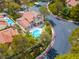 Aerial view showcasing the home's pool, landscaping, and location within a charming neighborhood at 7988 Pinnacle Peak Ave, Las Vegas, NV 89113