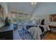 Bright bedroom with backyard access, features a neutral color scheme and minimalist decor at 7988 Pinnacle Peak Ave, Las Vegas, NV 89113