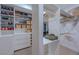 Organized walk-in closet with custom shelving and ample storage space for clothing and accessories at 7988 Pinnacle Peak Ave, Las Vegas, NV 89113