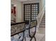 Bright foyer with modern staircase, beautiful doors and wood flooring at 7988 Pinnacle Peak Ave, Las Vegas, NV 89113