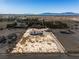 Expansive aerial view of the property, outbuildings and surroundings at 861 Mcmurray Dr, Pahrump, NV 89060