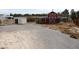 Red barn with white trim at 861 Mcmurray Dr, Pahrump, NV 89060
