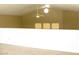 Bright bonus area with vaulted ceiling, ceiling fan, and unique octagonal window at 861 Mcmurray Dr, Pahrump, NV 89060