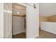 Walk-in closet with shelving and laminate wood flooring at 861 Mcmurray Dr, Pahrump, NV 89060