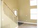 View of front door and stairway leading to the upper floor at 861 Mcmurray Dr, Pahrump, NV 89060