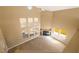 Bright, open living room featuring a fireplace and large windows at 861 Mcmurray Dr, Pahrump, NV 89060