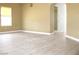 Living room highlighting hardwood floors and archway leading to bathroom at 861 Mcmurray Dr, Pahrump, NV 89060