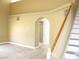 View of staircase and arched doorway leading to bathroom at 861 Mcmurray Dr, Pahrump, NV 89060