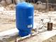 Close-up of a blue water pressure tank at 861 Mcmurray Dr, Pahrump, NV 89060