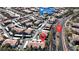 Aerial view of the community, community pool, street and surrounding landscaping at 950 Seven Hills Dr # 2418, Henderson, NV 89052