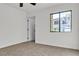 Bedroom featuring a window and access to other rooms at 950 Seven Hills Dr # 2418, Henderson, NV 89052