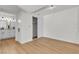 Bedroom showcasing wood flooring, minimalist lighting, and closet with sliding doors at 950 Seven Hills Dr # 2418, Henderson, NV 89052