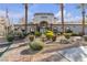 Horizons Clubhouse exterior featuring manicured landscaping and stately architecture at 950 Seven Hills Dr # 2418, Henderson, NV 89052