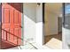 Inviting entryway with a red door leading into a bright, airy interior space at 950 Seven Hills Dr # 2418, Henderson, NV 89052