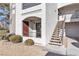 Charming condo featuring a covered entryway and staircase leading to upper units at 950 Seven Hills Dr # 2418, Henderson, NV 89052