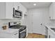Well-appointed kitchen featuring stainless steel appliances and ample white cabinetry at 950 Seven Hills Dr # 2418, Henderson, NV 89052