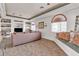 Cozy living room with custom bookshelves, built-in window seat, and plush seating at 950 Seven Hills Dr # 2418, Henderson, NV 89052