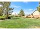 Well-maintained community park featuring green spaces, benches, and walking paths at 9617 Sharp Horn Ct, Las Vegas, NV 89149