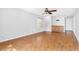 Open-concept living area features laminate flooring and a built in cabinet at 9617 Sharp Horn Ct, Las Vegas, NV 89149