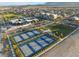 A view of community amenities including tennis courts, recreation areas and well-manicured landscaping at 10216 Chrysolite Pl, Las Vegas, NV 89143