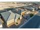 Overhead view of the houses with landscaping, modern design, and ample parking at 10216 Chrysolite Pl, Las Vegas, NV 89143