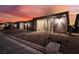Inviting home exterior with low-maintenance landscaping and a cozy front porch at 10216 Chrysolite Pl, Las Vegas, NV 89143