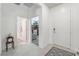 Bright foyer with tiled floors and a view into the living spaces at 10216 Chrysolite Pl, Las Vegas, NV 89143
