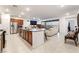Bright, open floor plan with a spacious kitchen and living area with modern finishes and beautiful views at 10216 Chrysolite Pl, Las Vegas, NV 89143