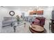 Bright living room with neutral tones, modern furniture and an open concept layout at 10216 Chrysolite Pl, Las Vegas, NV 89143