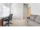 Bright office with carpeting, a desk, and closet space at 10216 Chrysolite Pl, Las Vegas, NV 89143