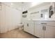 Bathroom with a white vanity and framed mirror over the sink at 10415 Andele Ave, Las Vegas, NV 89166