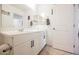 Bathroom with a white vanity, a ceramic tile floor and a framed mirror at 10415 Andele Ave, Las Vegas, NV 89166