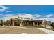 Community clubhouse with neutral paint, ample parking and well-kept landscaping at 10415 Andele Ave, Las Vegas, NV 89166
