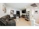 Spacious living room with a large sectional sofa, recessed lighting, and modern décor at 10415 Andele Ave, Las Vegas, NV 89166