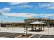 Inviting community park featuring a shaded picnic area and playground, ideal for Gathering gatherings and recreation at 10415 Andele Ave, Las Vegas, NV 89166