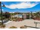 A fenced community pool area features lush landscaping and inviting pool views at 10415 Andele Ave, Las Vegas, NV 89166