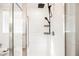 Modern shower with black fixtures and glass enclosure at 10415 Andele Ave, Las Vegas, NV 89166