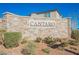 Elegant Cantaro community sign with stone base surrounded by attractive landscaping, set against a clear sky at 10415 Andele Ave, Las Vegas, NV 89166