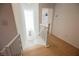 Bright staircase with wood floors and white railings at 10415 Andele Ave, Las Vegas, NV 89166