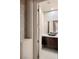 Tastefully designed bathroom featuring a vessel sink, accent wall and modern fixtures at 1172 Monte De Luz Way, Henderson, NV 89012