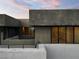 Exterior showcasing a modern home design with large windows and a rooftop patio at 1172 Monte De Luz Way, Henderson, NV 89012