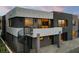 Modern home featuring a unique gray stucco exterior with a spiral staircase at 1172 Monte De Luz Way, Henderson, NV 89012