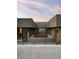 Home's exterior featuring a rooftop patio with city views in the distance at 1172 Monte De Luz Way, Henderson, NV 89012