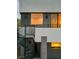 Contemporary home exterior featuring a spiral staircase leading to a balcony with sleek railing at 1172 Monte De Luz Way, Henderson, NV 89012
