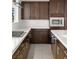 Sleek kitchen design with modern cabinets, countertops, and stainless steel appliances at 1172 Monte De Luz Way, Henderson, NV 89012