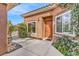 Exterior view featuring a water feature, private courtyard and gated entry to the property at 11730 Stonewall Springs Ave, Las Vegas, NV 89138