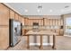 Gourmet kitchen with stainless steel appliances, granite countertops, and a spacious center island at 11730 Stonewall Springs Ave, Las Vegas, NV 89138