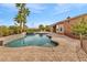 Inviting backyard pool and spa featuring lush, mature tropical landscaping at 11730 Stonewall Springs Ave, Las Vegas, NV 89138
