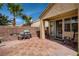 Backyard includes a tiled patio, grill, and easy access to the house via a sliding door at 1375 Gran Vista Ave, Henderson, NV 89012